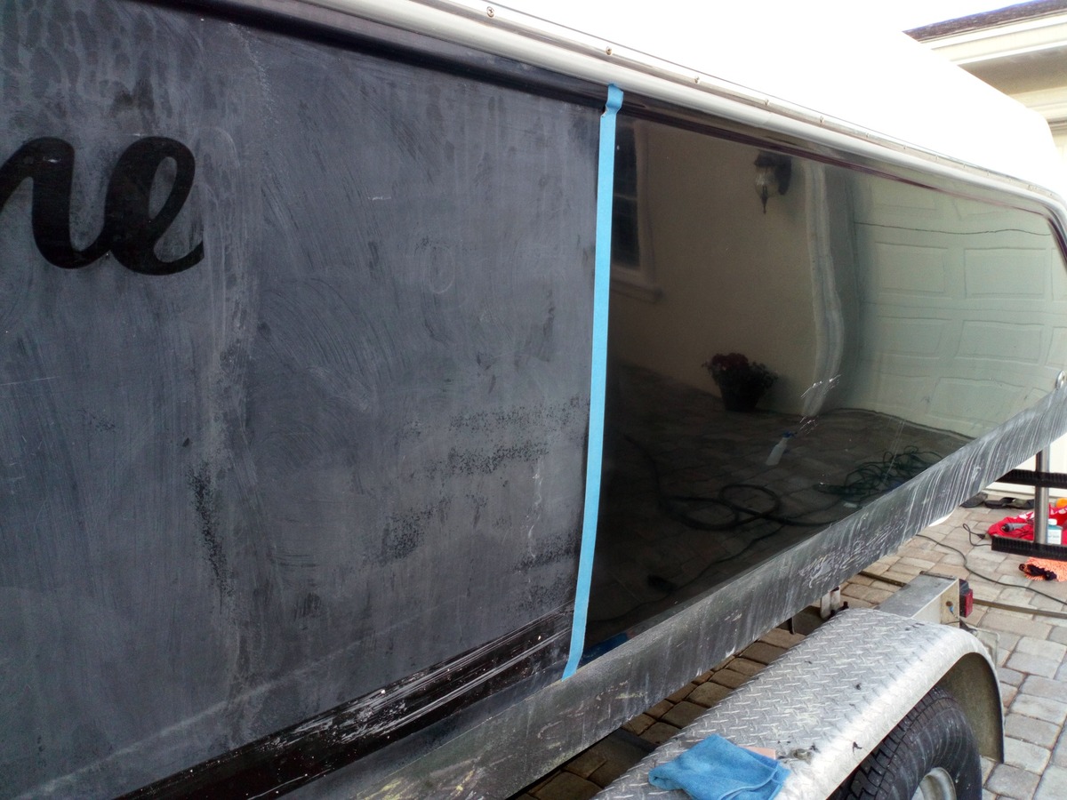Black boat hull gelcoat restoration before and after in Tampa Bay