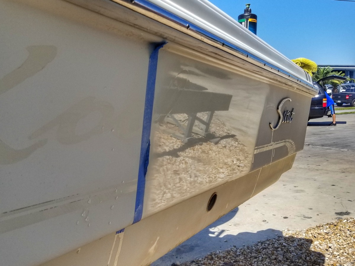 Scout boat hull gelcoat correction with mirror reflection in Tampa Bay