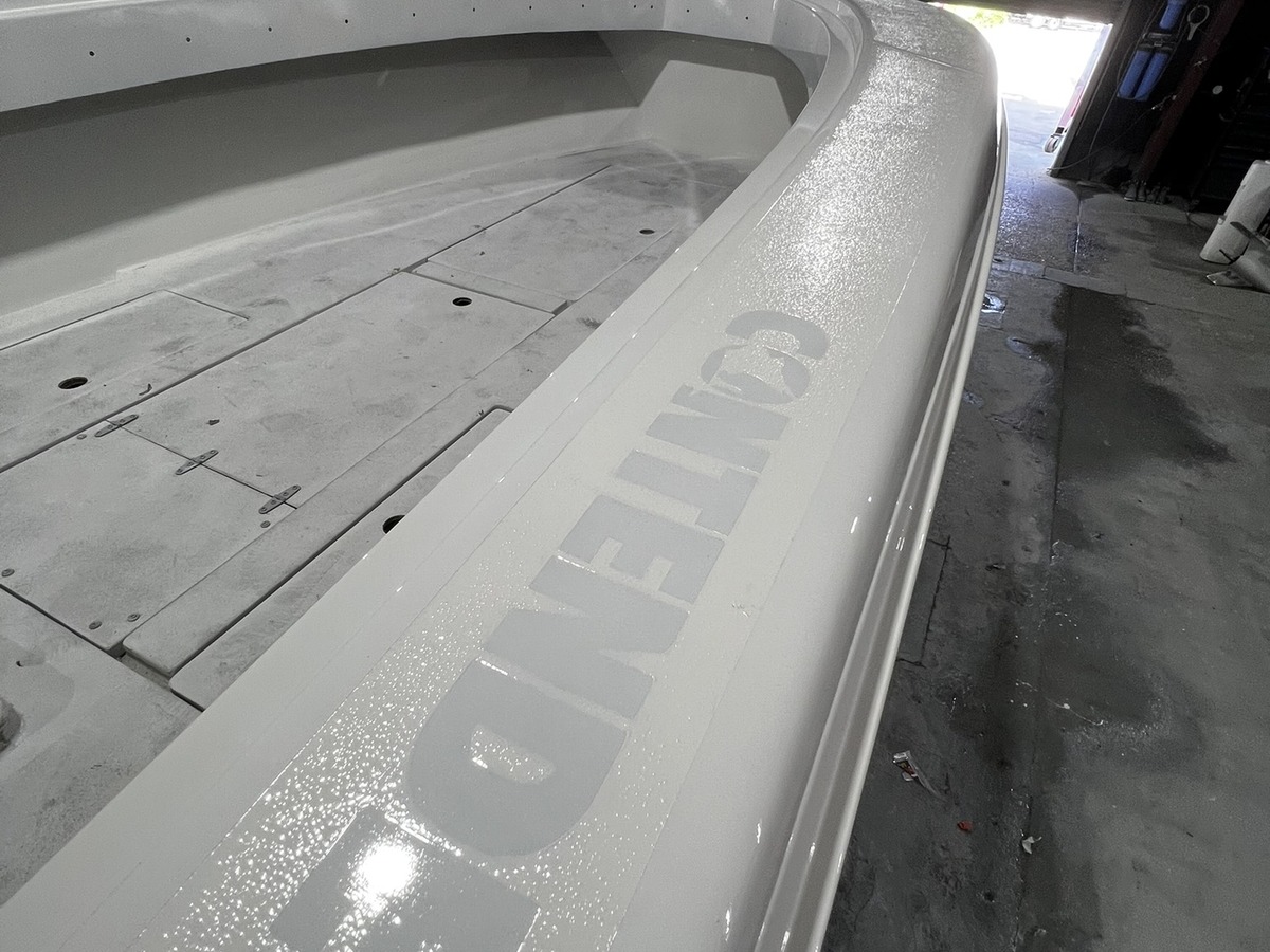 Custom non-skid and logo in-lay on a Contender boat in Tampa